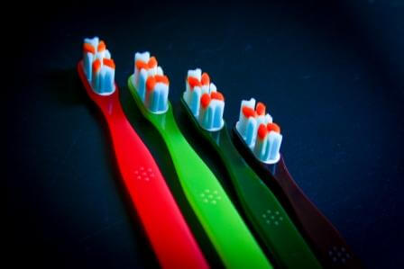 Toothbrush with the most tightly implanted tapered bristles
